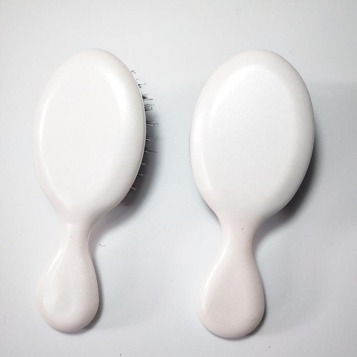 Guangzhou Factory Customized Mini Logo Size Oval Cushion Detangling Kids Hair Brush